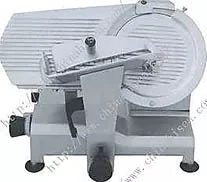 Commercial meat slicer. Gray machine with circular blade, food carriage, and thickness adjustment knob.